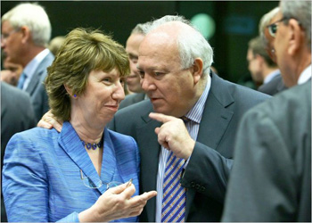 Catherine Ashton, the European Union foreign policy chief, with Foreign Minister Miguel Ángel Moratinos of Spain in Brussels on Monday. The bloc's Iran sanctions exceed the United Nations'.