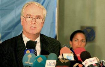 n's Ambassador to the UN Mark Lyall Grant (L) speaks to the press as US Ambassador to the UN Susan Rice listens