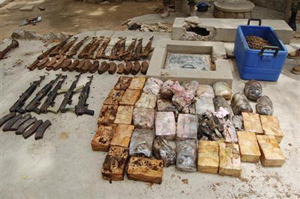 Ammunition and explosives seized from suspected members of Hezbollah are displayed after a raid of a building in Nigeria's northern city of Kano May 30, 2013