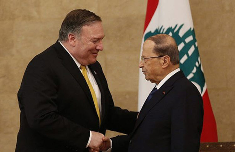 US Secretary of State Mike Pompeo, left, shakes hands with Lebanese President Michel Aoun