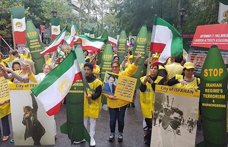 iranian supporters of the opposition PMOI/MEK rally in NYC against the mullahs' regime