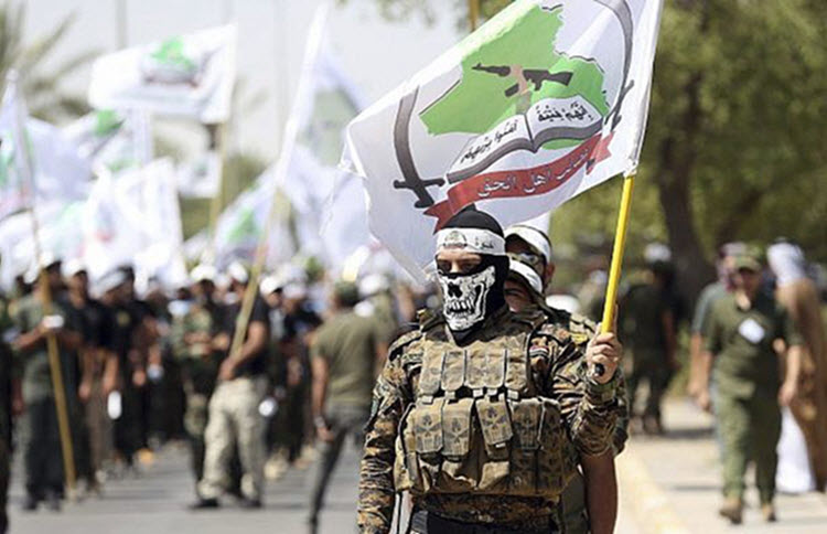 Members the Iran-backed Asaib Ahl al-Haq paramilitary group in Baghdad, Iraq.