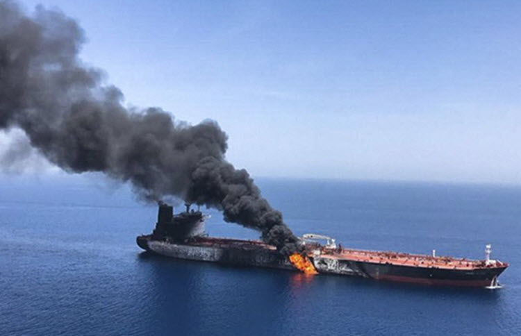 An oil tanker is on fire in the sea of Oman, June 13, 2019.