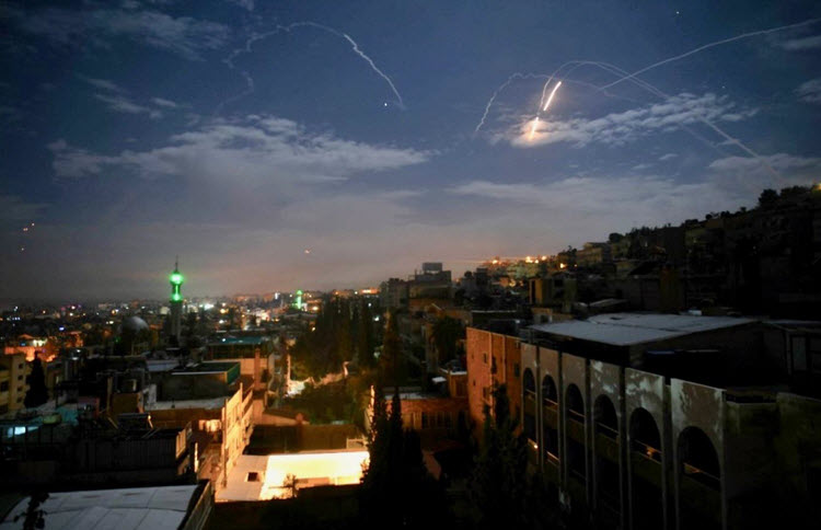 Israel claims responsibility for airstrikes near Damascus, saying it foiled 'large-scale attack' by Iran