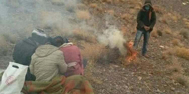 Iranian students must gather around the fire to receive education due to the lack of educational infrastructures.